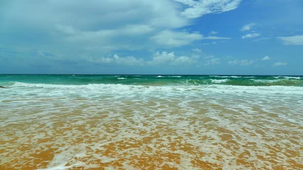 Beautiful tropical beach sea ocean with blue sky and white cloud