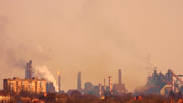 Industrial city. Heavy industry footage. Industrial chimneys smoke.