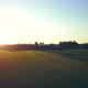 Aerial Cinematic Clip Drone Flying Over a Farm Field During Sunset - VideoHive Item for Sale