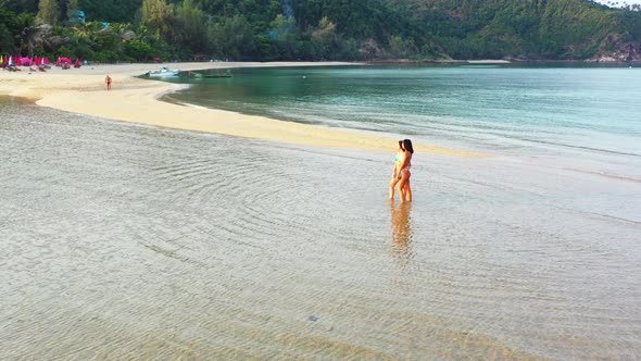 Sexy Beauty Models on Photoshoot Having Fun on The Beach on Paradise White Sand and Blue