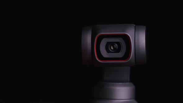 Mechanical Gimbal Camera Lens Rotates on Black Background Robotic Camera Macro
