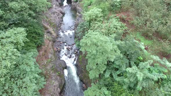 Flight Over the Rocky Canyon and Creek