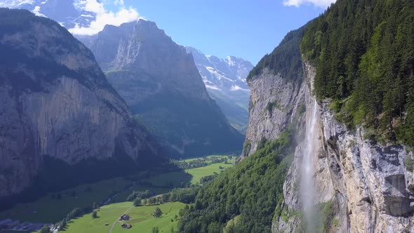 Aerial travel drone view of the Lauterbrunnen Valley and Staubbach Falls, Switzerland.