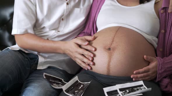 Pregnant Couple Feels Love and Relax at Home