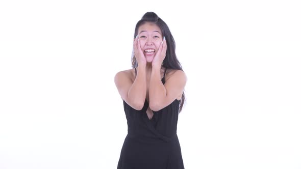 Happy Beautiful Asian Woman Getting Good News