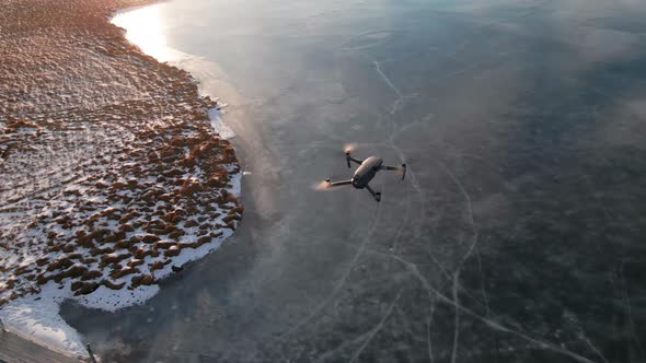 Drone Shot Of Drone Flying Over Frozen Lake