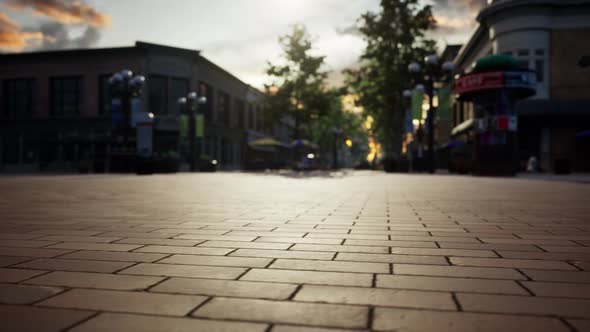 Empty Tiled Floor and Urban Skyline