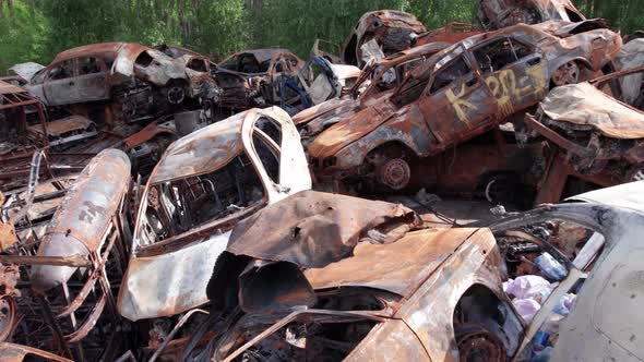 War in Ukraine a Dump of Shot and Burned Cars in Irpin Bucha District