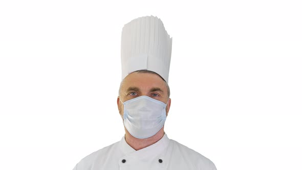 Male Chef Cook Wearing Face Protective Medical Mask for Protection From Virus Disease on White