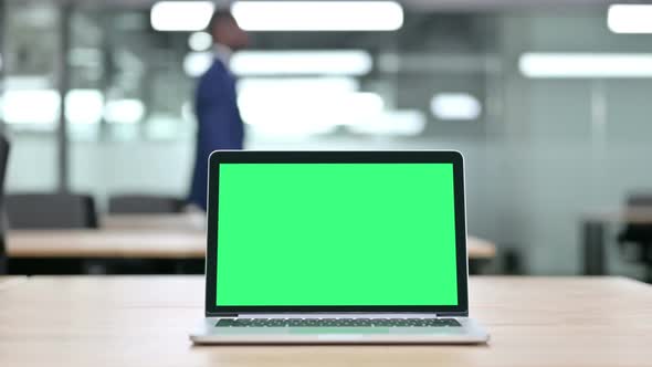 Laptop with Chroma Screen on Tablet in Office