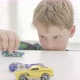 Boy playing with toy cars - VideoHive Item for Sale