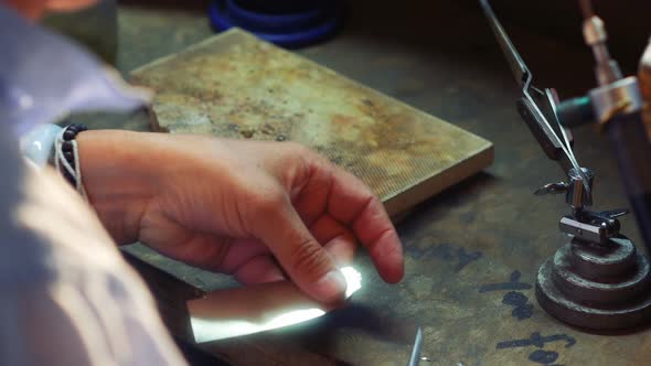 Craftswoman working in workshop