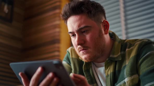 Businessman checking bitcoin price chart on digital exchange on mobile phone screen, cryptocurrency