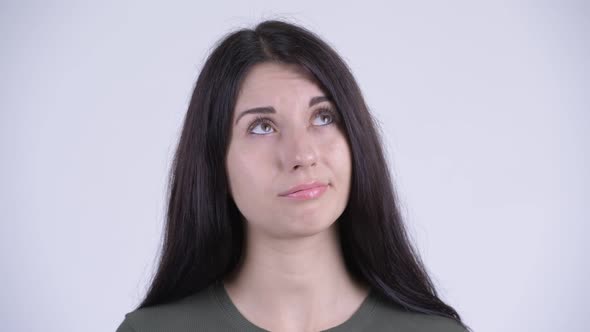 Face of Young Stressed Woman Looking Bored and Tired