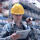 Worker Male Warehouse Worker Engineer Man in a Helmet Working on the Construction Site of the - VideoHive Item for Sale