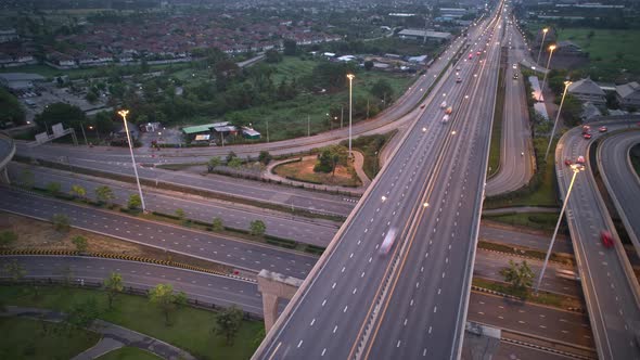 4K : Aerial Hyper lapse drone view of road junction with moving cars. alt