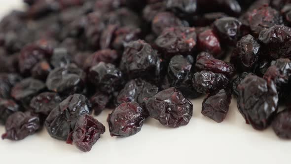 Slow pan over ehydrated cranberries 4K 2160p 30fps UltraHD footage - Vaccinium oxycoccos on  pile 38