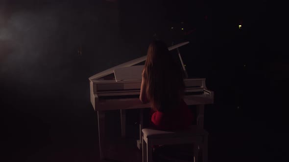 Footage Of Female Pianist Plays In Beautiful Grand Piano On Stage In Concert