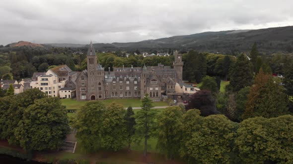 Approaching beautiful Fort Augustus Abbey on Loch Ness, aerial