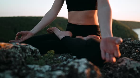 Young Woman Doing Yoga Belly Exercise  Kapalabhati Yogic Breathing Technique