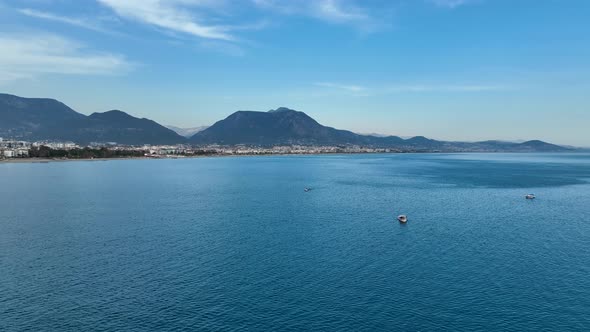 Fishing boat goeas to sea aerial view Turkey Alanya 4 K