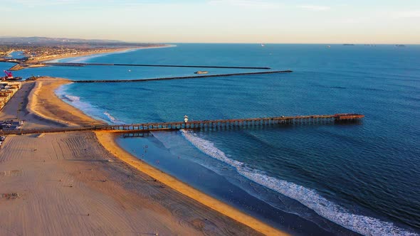 Flying away from the Anaheim Bay Jettys and the Seal Beach Pier.