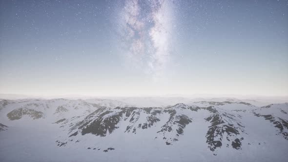 Milky Way Above Snow Covered Terrain alt