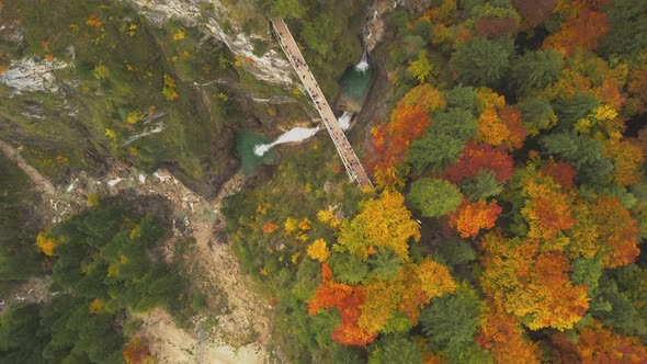 AERIAL: Bridge in Mountains and Forest Over Waterfall in Germany, Colourful Summer