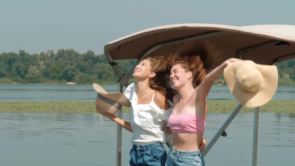 Young People Relaxing on a Yacht