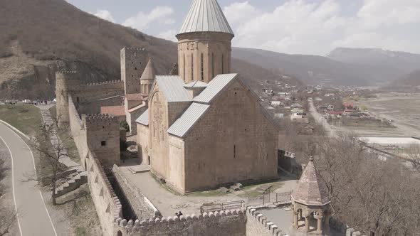 Aerial view of old Ananuri Fortress with two churches and picturesque view on river. Georgia 2021