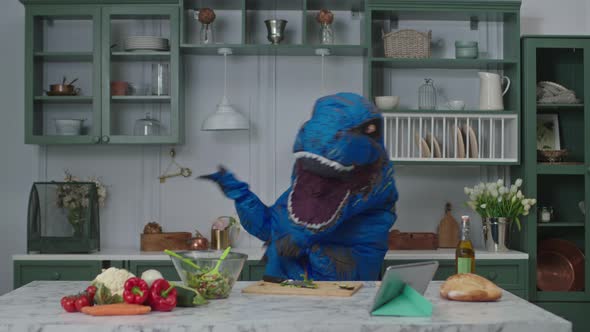 Big Blue Dinosaur Dancing Positive in Kitchen
