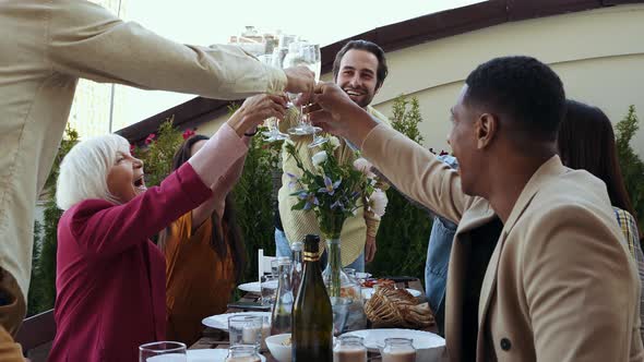 Family and friends having dinner together