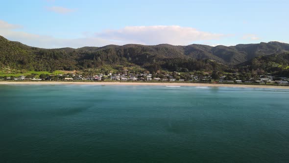 Aerial view of secluded beach town in New Zealand