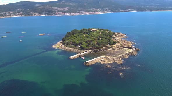 Aerial View Of Illa De Creba in Ria Muros y Noya Galicia Spain. Dolly Back