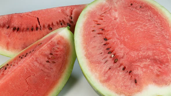Half A Watermelon And Two Big Slices