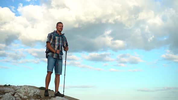 Travel Mountain Hike Caucasian Man Hiker Walking Along Rocky Terrain Then Looking at Natural Scenery
