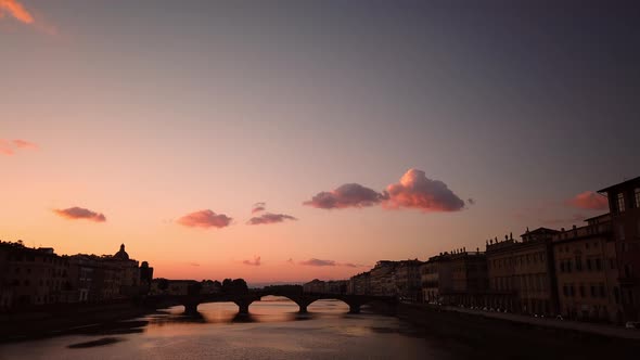Timelapse of old bridge at sunset. Florence italy
