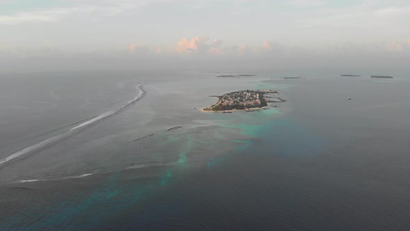 Aerial of an Island in the middle of the ocean.