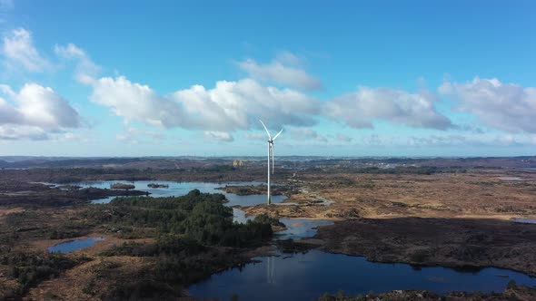 Two enercon wind turbines in Gismarvik Norway during beautiful sunny day - Aerial panoramic view sho