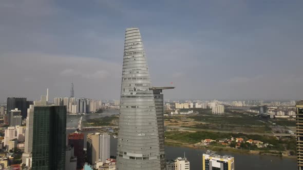 Aerial View of Bitexco Financial Tower, Skyscraper and Landmark of Ho Chi Minh, Vietnam, Drone Shot