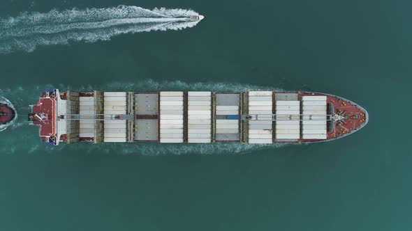 Large Container Ship in the Sea. Aerial Vertical Top-Down View