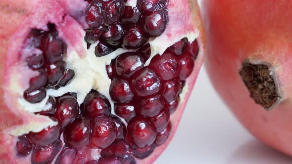 Shallow DOF  red seeds inside Lythraceae family pomegranate  4K 3840X2160 UHD tilting video - Health