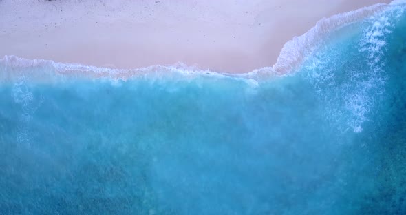 Luxury fly over abstract view of a white sand paradise beach and blue water background in colourful 
