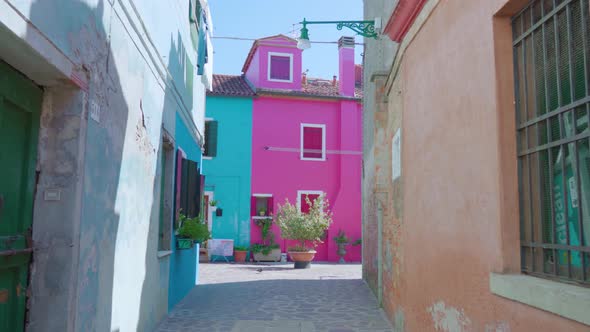 Street Between Old Colorful Houses in Burano on Sunny Day