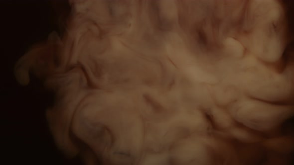 Super Slow Motion Shot of Pouring Milk Into Coffee at 1000Fps