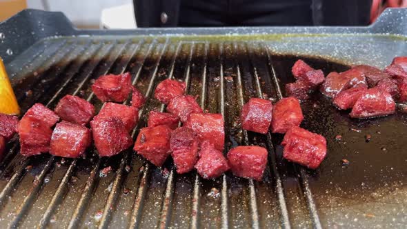 Sausage On Electric Barbecue