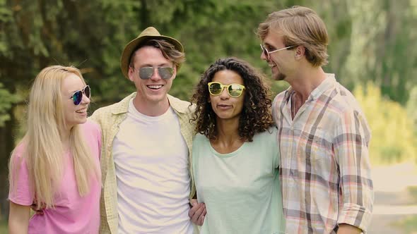 Young Beautiful Couples Joking and Laughing in Summer Camp, Holidays, Fun