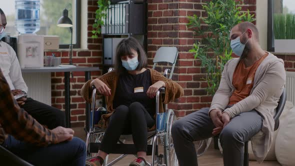 Woman with Disability Attending Aa Group Therapy Session with People in Circle