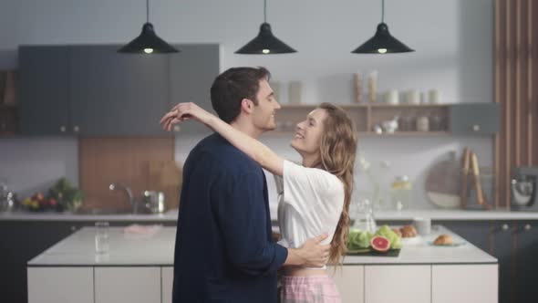 Loving Couple Dancing Slowly at Kitchen, Two Fancy People Enjoying Time Together