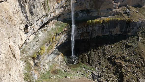 High Waterfall Falling From the Plateau Into the Gorge